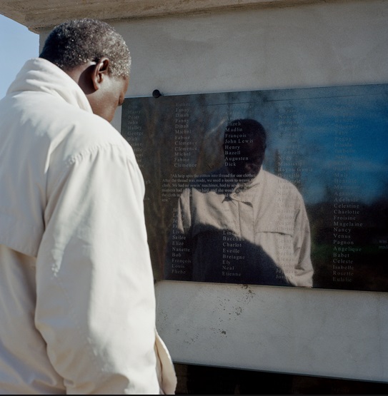 Ibrahima Seck, the Whitney's director of research, at a memorial on the plantation. Credit: Mark Peckmezian for the New York Times